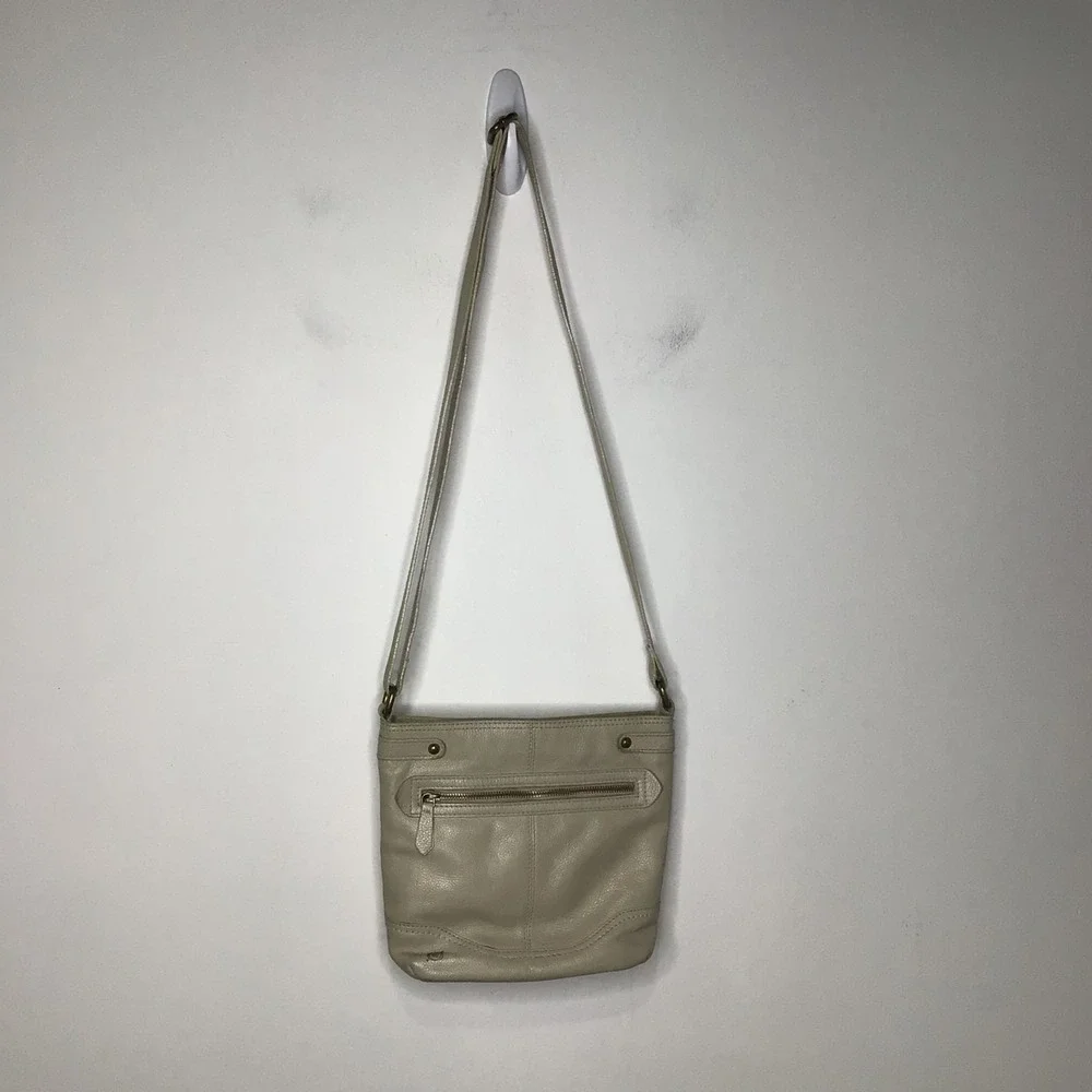 Born tan‎ leather crossbody bag